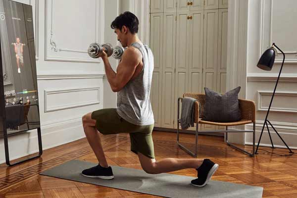 fente avec haltère pour se muscles les jambes à la maison